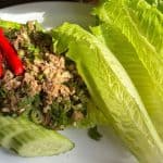 Vegan Laab served with lettuce leaves and cucumber
